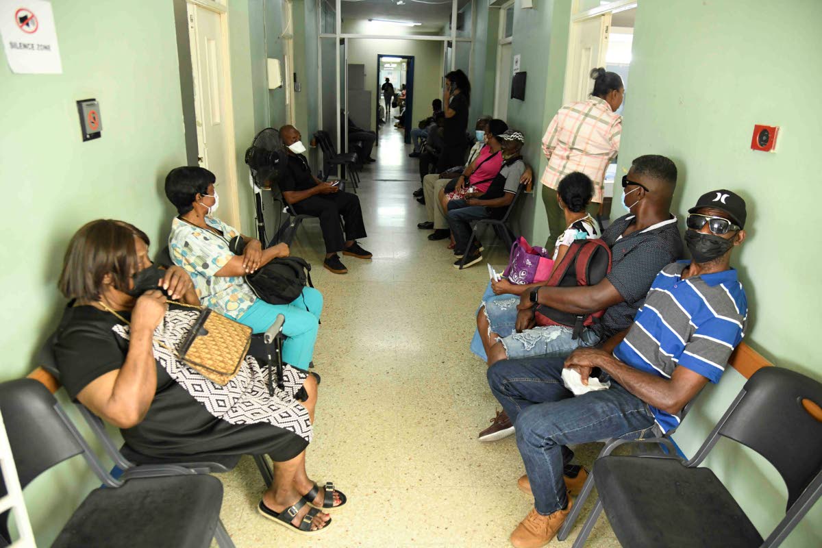 Patients wait to be served inside the eye clinic at St Josephs Hospital in Kingston yesterday.