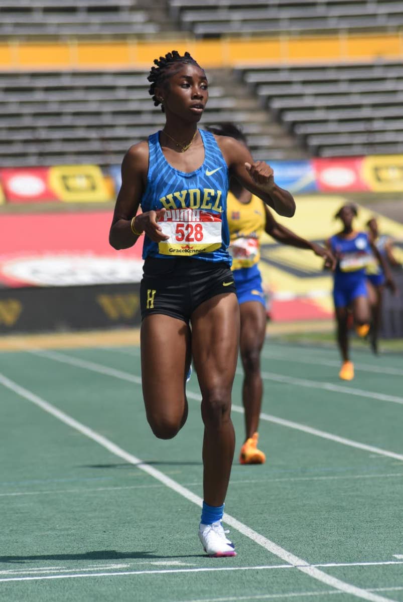 Hydel’s Nastassia Fletcher wins her race in the Girls’ Class One 400m at Champs 2026.