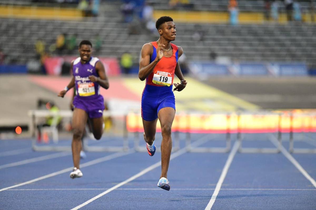 Roshawn Clarke of Camperdown High wins the Class One boys’ 400 metres hurdles final in a record 49.50 seconds at the 2022  ISSA/GraceKennedy Boys and Girls’ Championships at the National Stadium. 