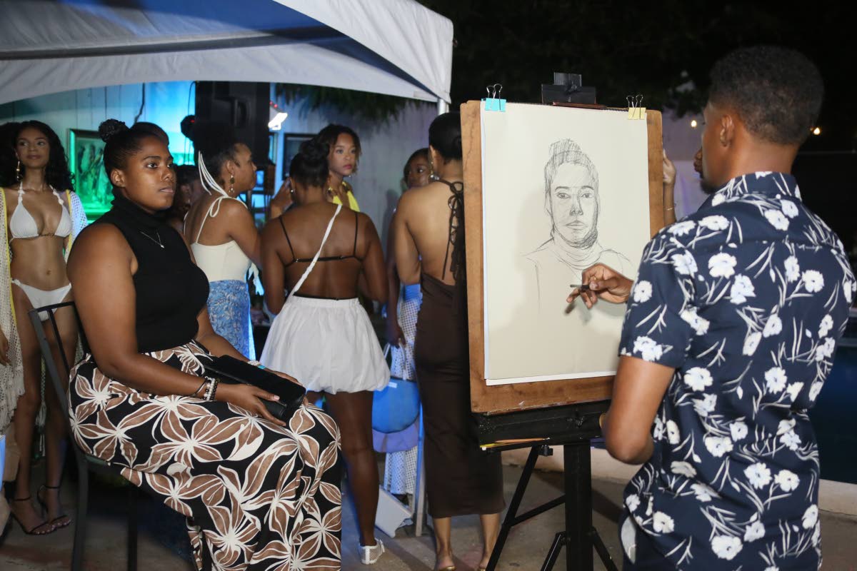 Artrich Studios’ live portrait artist Richard Smith in action, as he sketches one of the attendees at the debut Rhythm Sundays.