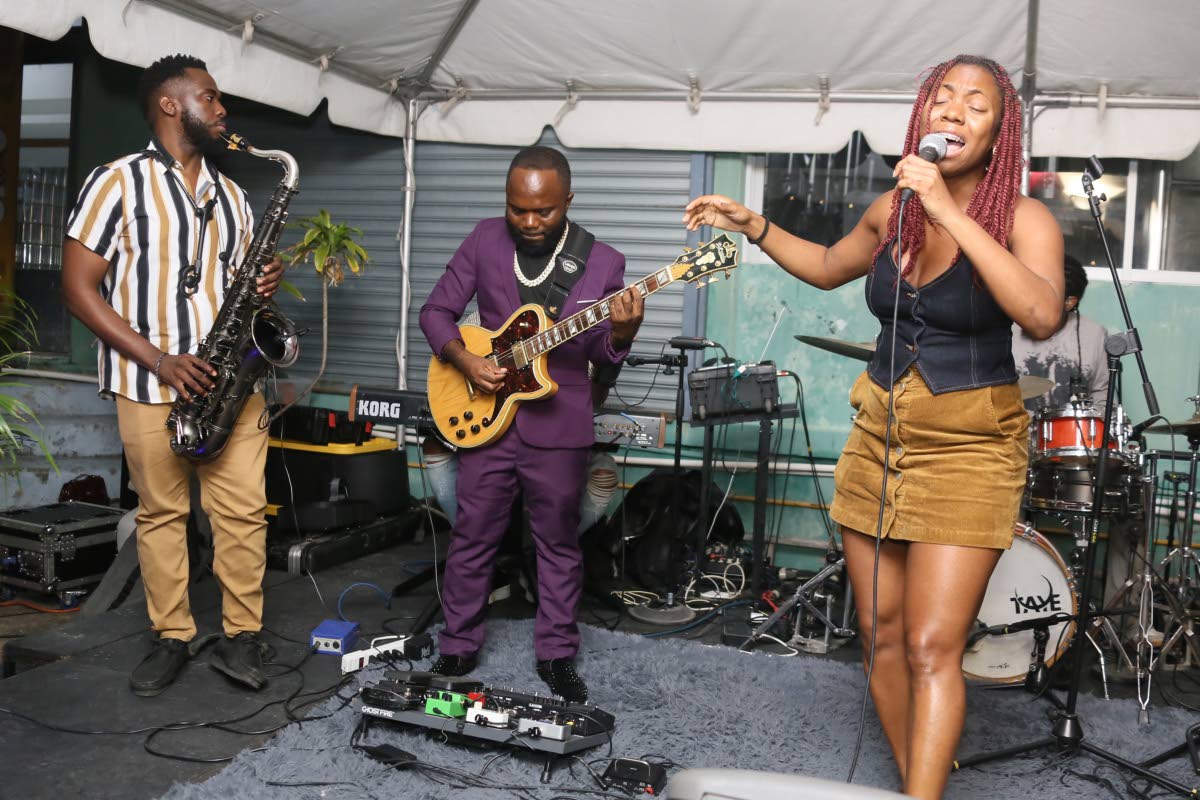 Bringing her sweet vocals to the stage, rising singer Tori Lattore (right) was right at home as she sang, supported by members of the Dub Squad band.