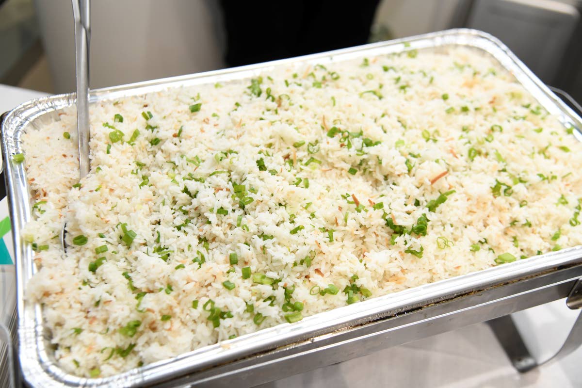 Fragrant coconut rice, lightly infused with island flavour, accompanies Uncorked Jamaica’s char-grilled shrimp dish, bringing a comforting Caribbean touch to the gourmet picnic menu.
