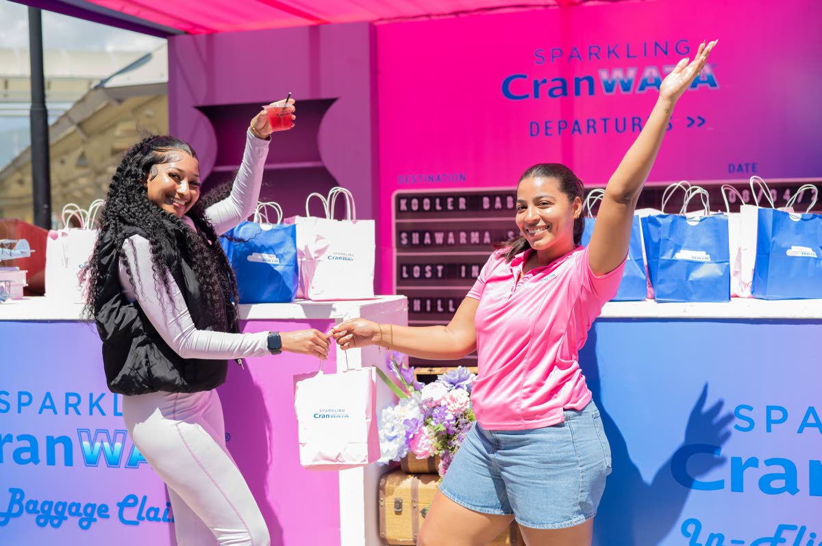 Brittany Thwaites (right), brand manager, CranWATA Portfolio, Wisynco Group, shares a celebratory moment with Norma-Lee Ali.