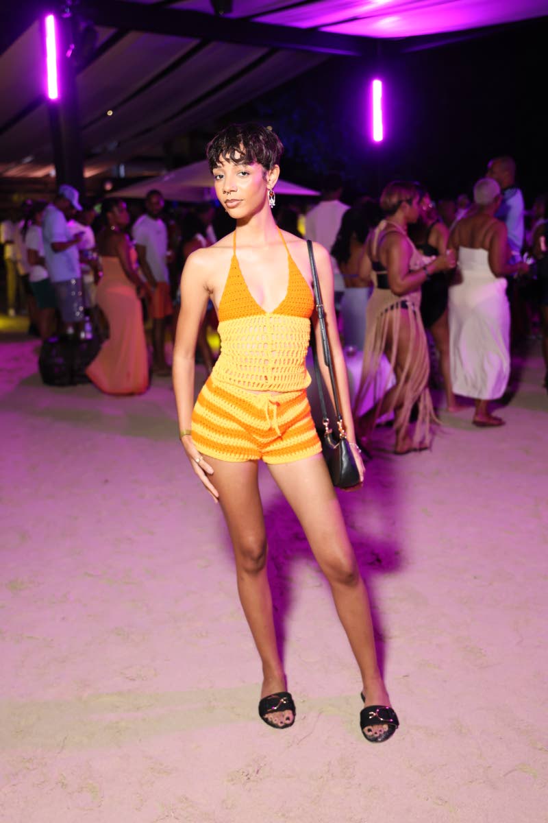 Content creator Shelby Bradshaw swipes right in a sweetheart shorts set from local brand Cally Co.