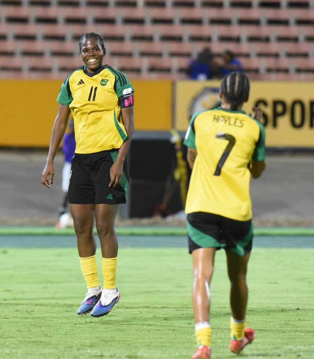 Jamaica’s Khadija ‘Bunny’ Shaw celebrates after scoring against Antigua and Barbuda during their Concacaf Women’s  qualifying match at the National Stadium last night. 