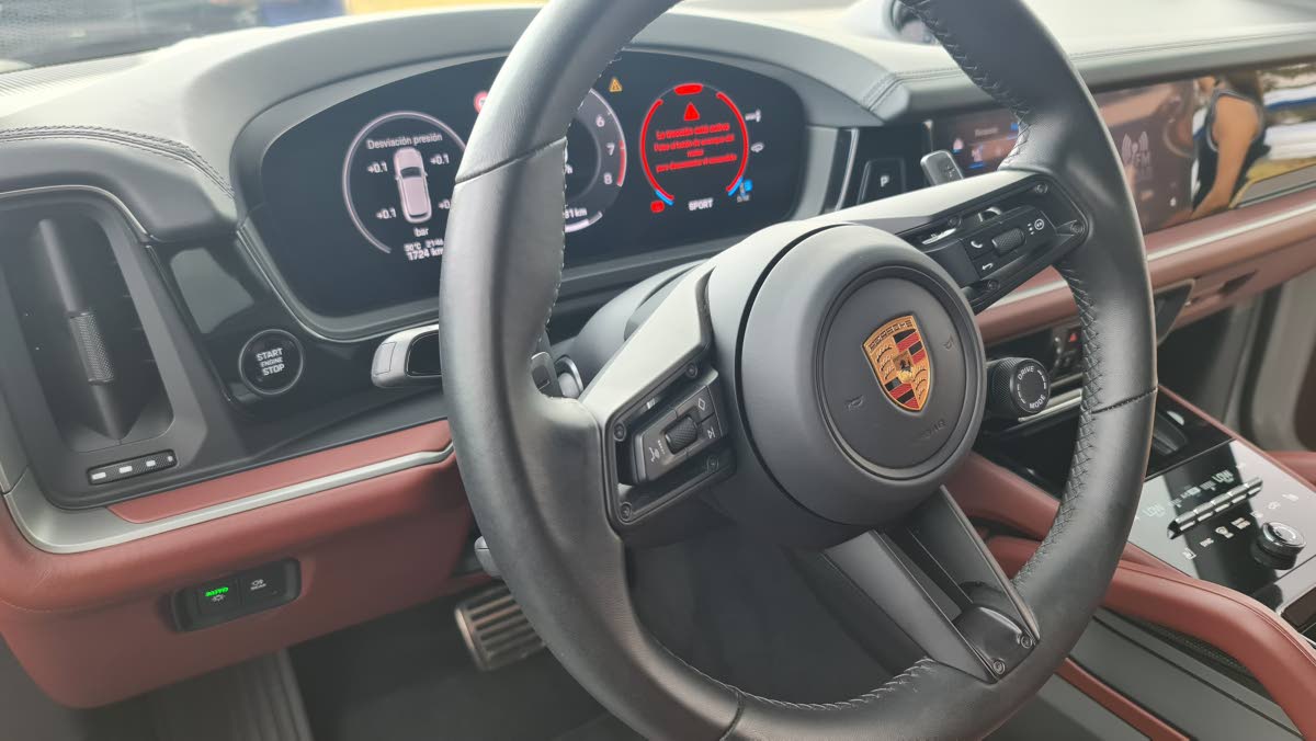 The driver’s cockpit, viewed through the optional GT Sports steering wheel, centres around the all-digital 12.6-inch curved instrument display, a crucial component of the brand’s ‘Driver Experience’ philosophy.
