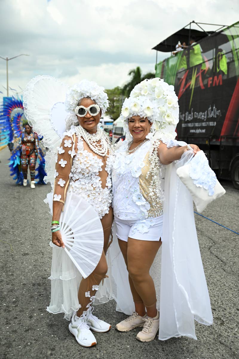 Carnival veterans Margaret Sylvester-Reid (left) and Corah Ann Robertson-Sylvester are looking like angels in their custom pieces from Lisa Campbell of Kayshan Made.