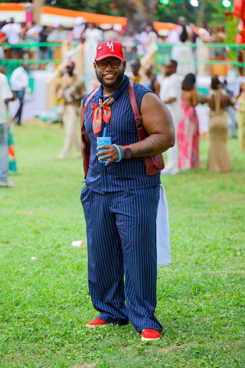 Entrepreneur Trevor Dixon mixes classic pinstripes with a dash of red accents.