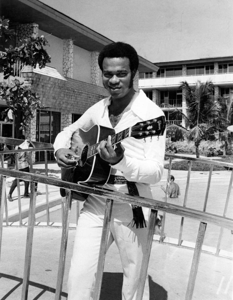 Ernie Smith is captured in a June 18, 1971, file photograph with his guitar in hand.