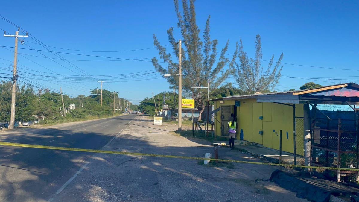 An Independent Commission of Investigations (INDECOM) team at the scene of a shooting in the community of Coffee Shop in Sandy Bay, Clarendon on Monday, April 20, 2026.
