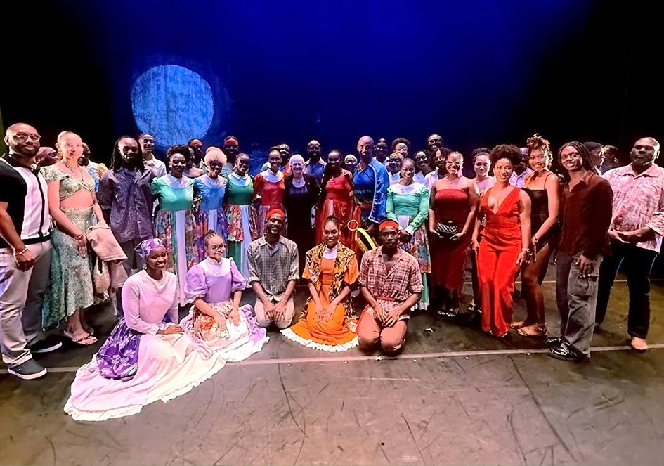 Participants pose for a photo with Jane Owen, governor of Cayman Islands.
