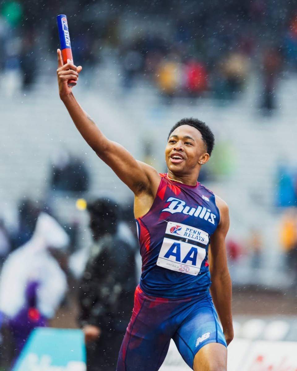 
Bullis High School’s Quincy Wilson raises his arms to the sky after taking his institution to the first win by an American school in the boys’ Championships of America 4x400-metre Relay at the Penn Relays at Franklin Field, Pennsylvania in almost 20 y