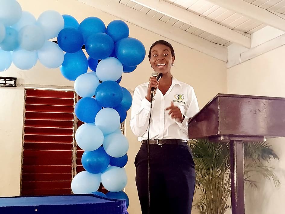 Lanisia Rhoden, founder and executive director of the YWOP/YMOP, addresses the launch of the collaborative entrepreneur assistance programme in Lucea, Hanover, being implemented by her organisation and the Flow Foundation.