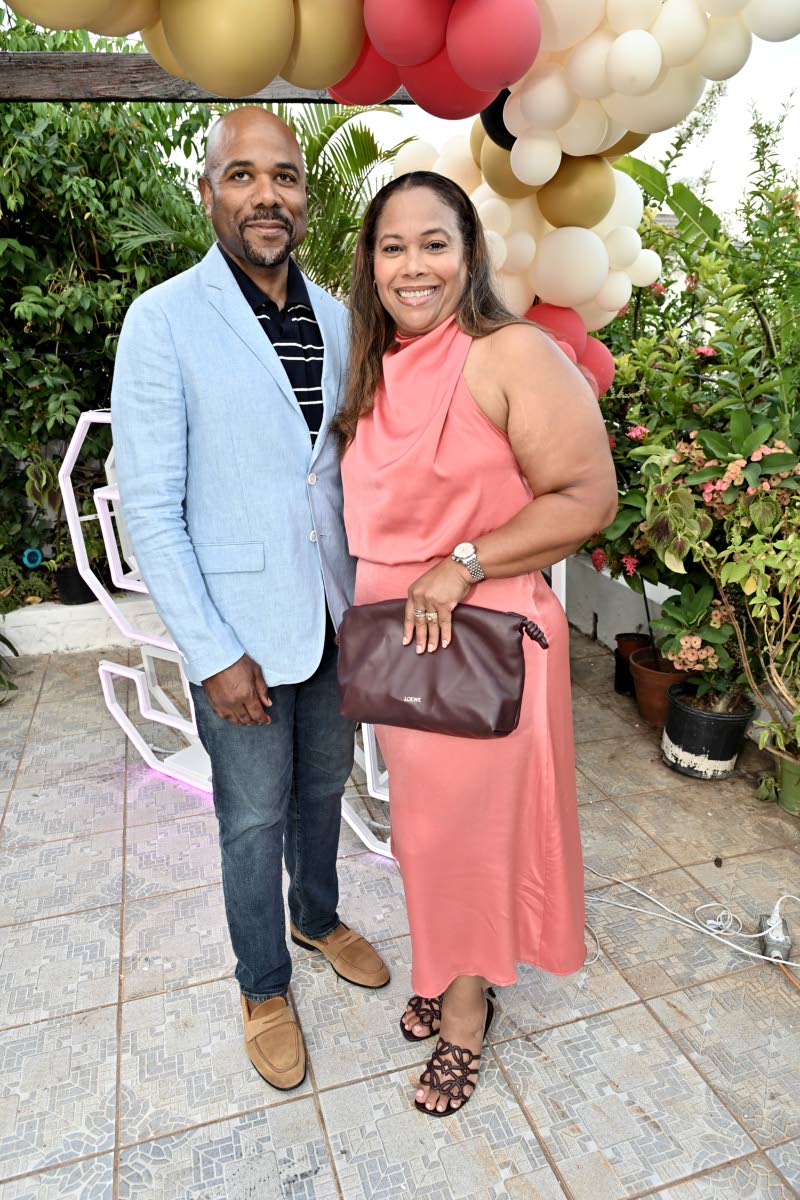 Cory Williams gets cosy with his wife, Sabrina.