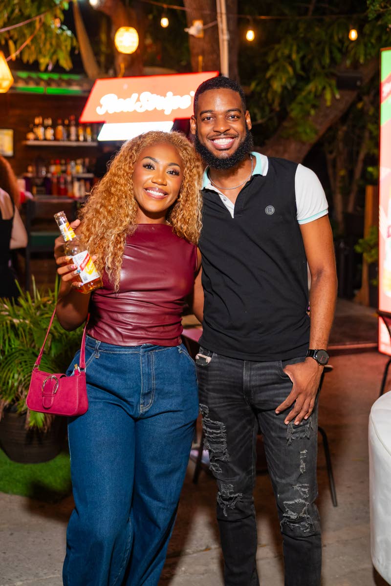 Tashnie Hinds 
pairs up with Joel Youngsang for a quick photo.