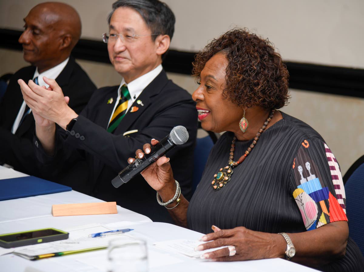 Olivia Grange, Minister of Culture, Gender, Entertainment and Sports, speaks during a signing ceremony between the JAAA and Japan for the 2027 World Athletics Championships yesterday at the Jamaica Pegasus Hotel in Kingston. 