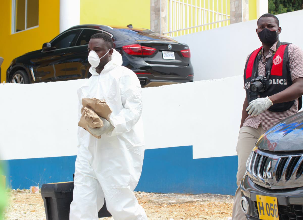 Police investigators collecting evidence at the Pathways International Kingdom Restoration Ministries in October 2021.