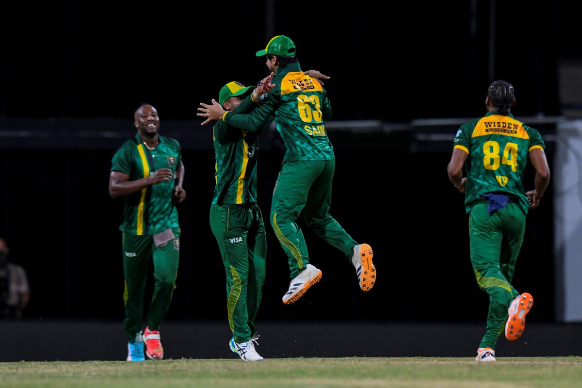 Courtesy of CPLT20 
Jamaica Kingsmen celebrate a wicket during their Republic Bank Caribbean Premier League cricket game against the Guyana Amazon Warriors on Friday.