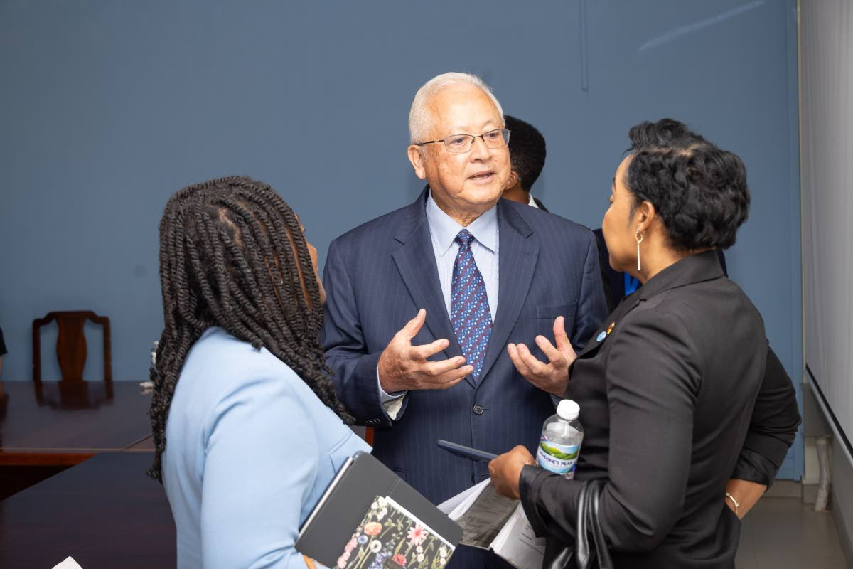 Minister of Justice and Constitutional Affairs Delroy Chuck speaking with defence attorneys at a meeting to discuss concerns about the Firearms Act on September 24, 2026.