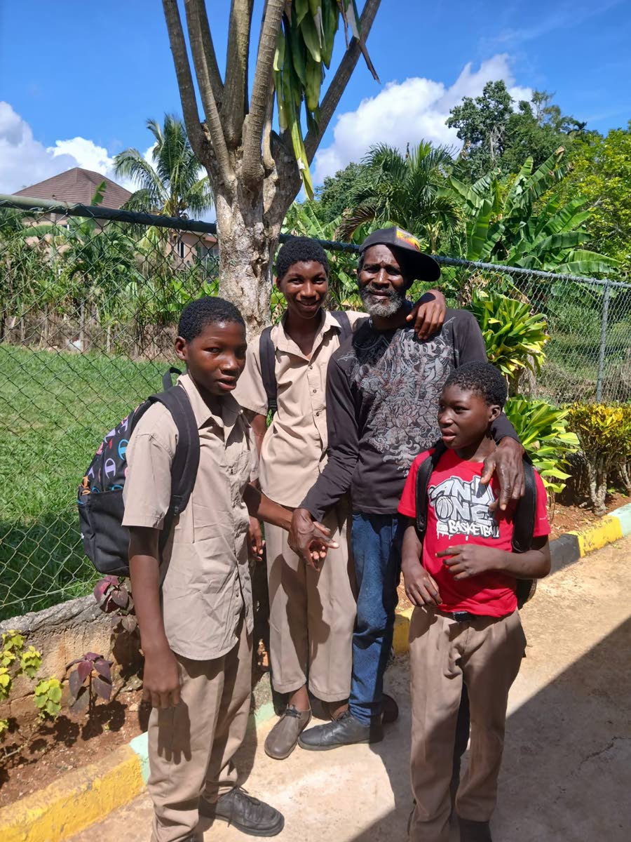 
Delroy Britton and his sons. 