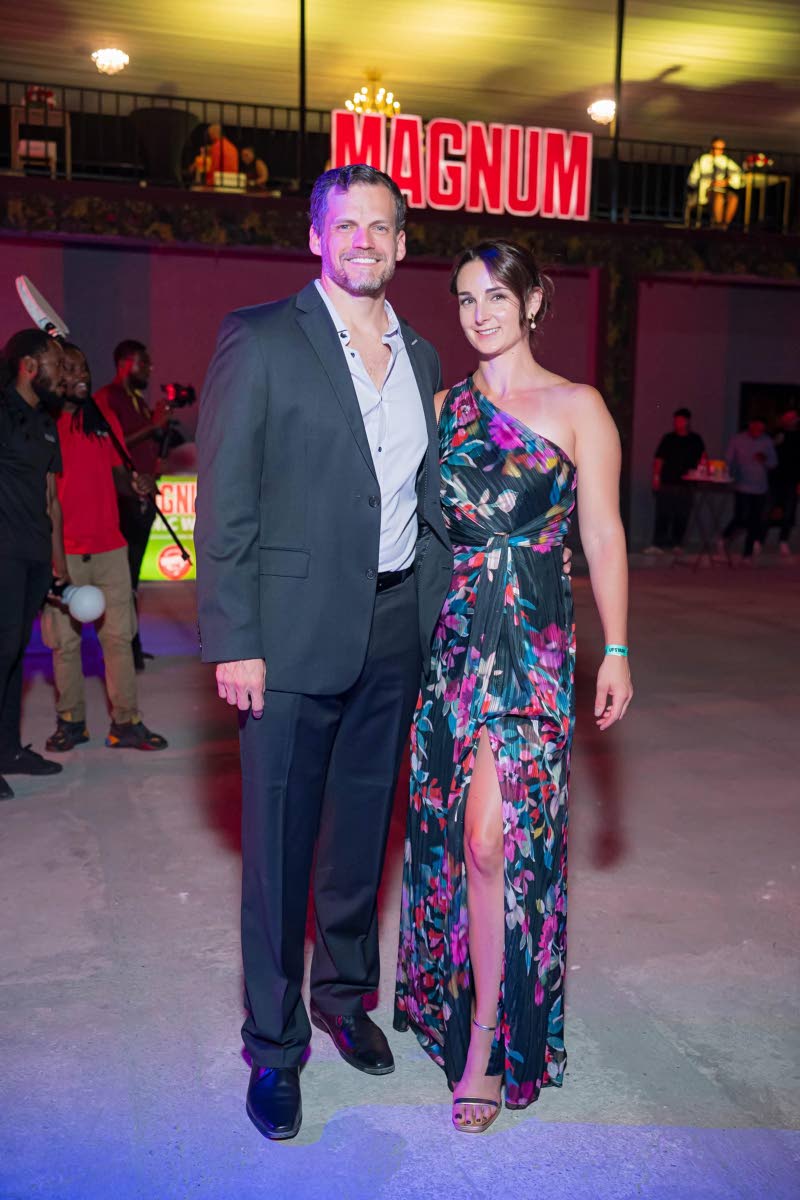 Jonathan Herger, vice-president of finance at Campari Group, and his wife, Kaisha Herger, are spotted soaking up the night’s festivities.