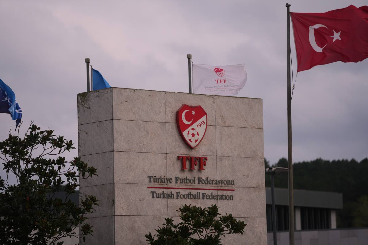 A Turkish flag waves at the Turkish Football Federation headquarters, in Istanbul on November 12, 2025. 