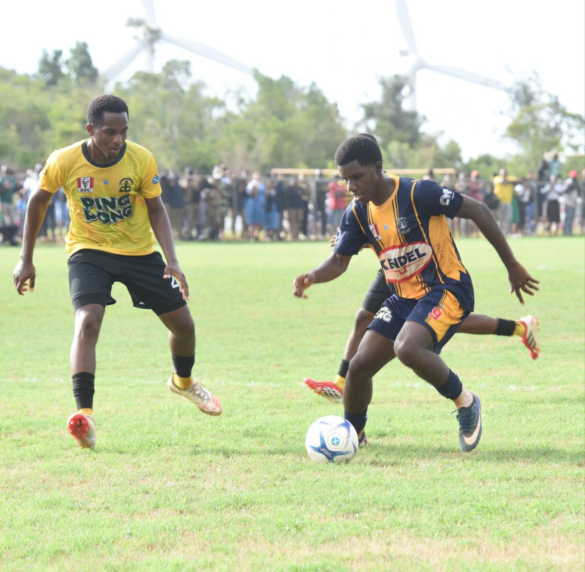  Munro College’s Kajaye Williams (right) tries to go past Black River High’s Tedraun Clarke during their ISSA daCosta Cup Zone D preliminary round match at Munro on Tuesday, September 22, 2026.