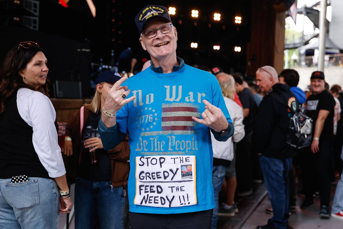 Festivalgoer Paul Gimler poses for a photo during the Power To The People Festival on Saturday.