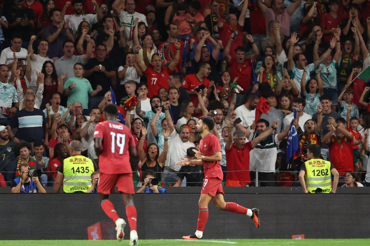 Portugal’s Goncalo Ramos (right) celebrates after scoring his side’s second goal during the Nations League  match between Portugal and Norway in Porto, Portugal, Sunday, October 4, 2026.  