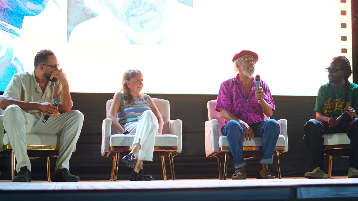 Documentarian Stephanie Black (second left) listens as economics professor Dr Michael Witter (second right) makes a comparative analysis of past and present financial landscapes during a panel discussion at Skylark Negril Beach Resort last Thursday. The se