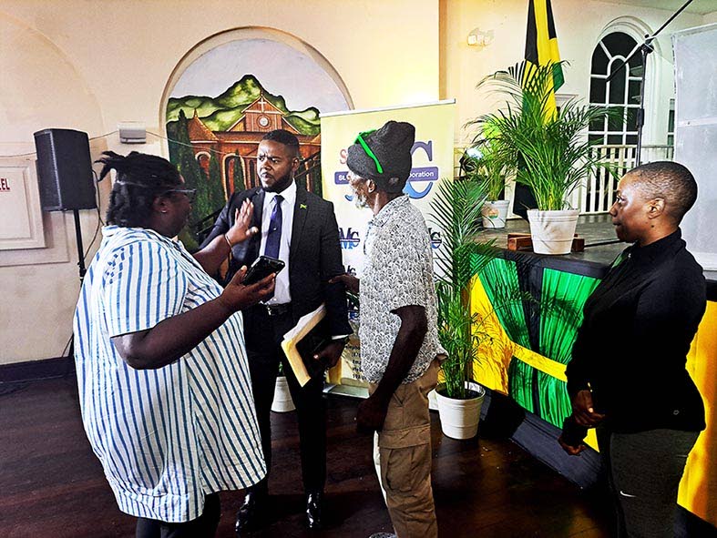 Montego Bay Mayor Richard Vernon (second left) speaks with attendees following the St James Municipal Corporation’s presentation of its projected $2.8-billion budget of expenditure for the 2027-28 financial year at the Montego Bay Cultural Centre in Sam 