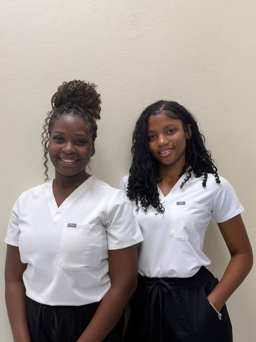 Medical students Ashli McCarthy (left) and Tiara Hayles pictured at the University of Guyana. McCarthy, who is in her final year, and Hayles, who is in her second year, have made their country proud in the South American country, retaining high grades thro