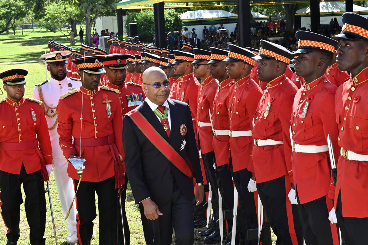 Governor-General Sir Patrick Allen inspects the Guard of Honour during the National Honours and Awards Ceremony 2026 at King’s House on Monday.