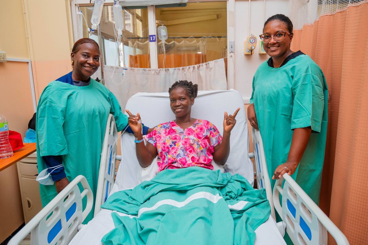 Contributed Photo
Patient Kashiema Ladrick (centre) rests in recovery at the University Hospital of the West Indies (UHWI) alongside Dr Sandra Lindsay (left), vice president of public health advocacy at Northwell Health and mission lead, and Dr Ruqayyah Ab