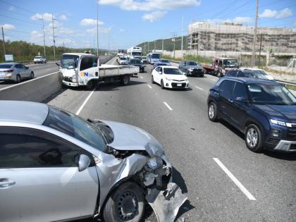 This February 17 photo shows a collision involving a Toyota Axio motor car and an Isuzu truck along Mandela Highway. 
