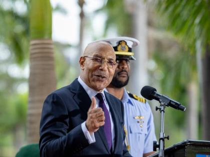 Governor General Sir Patrick Allen, the chief scout of Jamaica, addresses a public meeting of the Scout Association of Jamaica on February 26