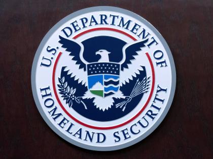 The seal of US Department of Homeland Security is seen before the news conference with Acting director of US Immigration and Customs Enforcement (ICE) Todd Lyons at ICE Headquarters, in Washington, on May 21, 2025. (AP Photo/Jose Luis Magana, File)