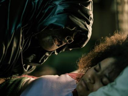 This image released by Warner Bros. Pictures shows a sleeping Zazie Beetz in a scene from ‘They Will Kill You’.