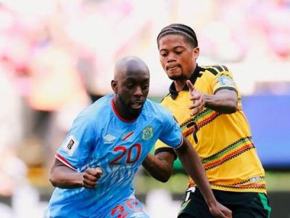 Jamaica’s Leon Bailey (right) and Yoane Wissa of the Democratic Republic of Congo (DR Congo) battle for the ball during the inter-continental World Cup playoff final in Guadalajara, Mexico, on March 31.  DR Congo won 1-0 in extra time to qualify for the 