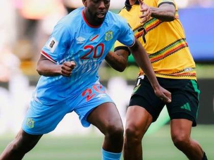 Jamaica’s Leon Bailey (right) and Yoane Wissa of the Democratic Republic of Congo (DR Congo) battle for the ball during the inter-continental World Cup playoff final in Guadalajara, Mexico, on March 31.  DR Congo won 1-0 in extra time to qualify for the 