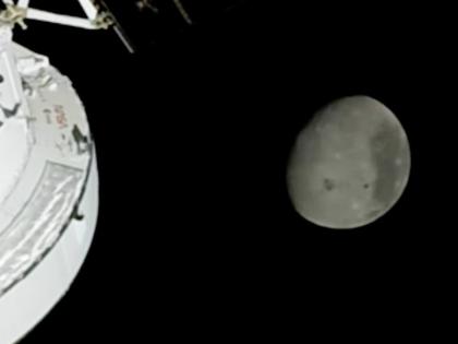 In this image from video provided by NASA, the Moon is seen from a camera outside the Orion Spacecraft after the Artemis II astronauts surpassed the farthest distance ever traveled by humans from Earth on April 6, 2026. (NASA via AP)