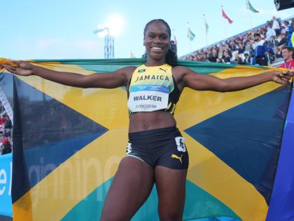 Jamaica’s Sanique Walker celebrates after winning the Women’s 400m Hurdles Final at the Commonwealth Games in Glasgow, Scotland yesterday.