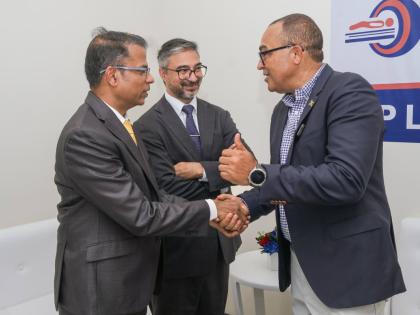 Dr Ravi Prakash Sangappa (left), chief executive officer, Oasis Imaging Centre; is greeted by Dr Christopher Tufton (right), minister of health and wellness; while Mayank Joshi, high commissioner of India to Jamaica, looks on during the official inaugurati