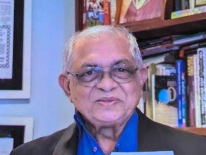 Tony Deyal with a copy of 1945 Nostalgia News