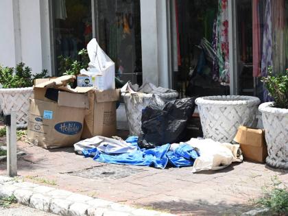 Items belonging to a homeless person are arranged in a makeshift living space near the Royal Decameron Montego Bay Beach Resort along Jimmy Cliff Boulevard in Montego Bay, St James, on Friday.