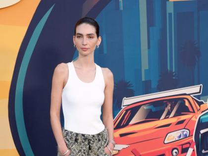 Meadow Walker, daughter of the late ‘The Fast and the Furious’ cast member Paul Walker, arrives at the 25th anniversary celebration screening of the film.