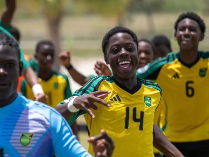 Courtesy of CFU 
Jamaica’s under-14 players celebrate a goal during the semi-final of the CFU Under-14 Challenge in the Dominican Republic on Friday.