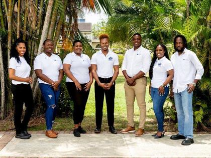 From left: Melisha Gordon (Chevening Scholar); Lamar-Shey Grant (Commonwealth Scholar); Emoney Clayton (Commonwealth Scholar); Akeem Campbell (Chevening Scholar); Ricardo Hunter (Commonwealth Scholar); Shaqkeera Douglas (Chevening Scholar); and Jerome Garw