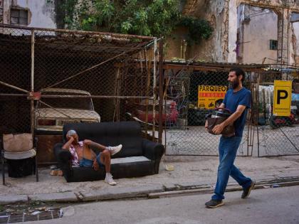 A man rests on a sofa on a street in Havana, Cuba, August 27.