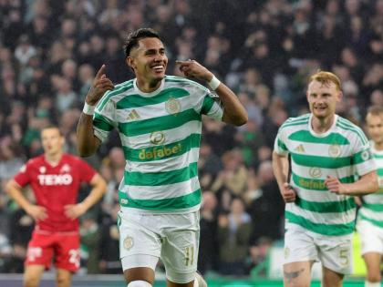 Celtic’s Camilo Duran, front, celebrates scoring their first goal against Aberdeen during a Scottish Premiership match, Wednesday September 2, 2026, in Glasgow, Scotland.  